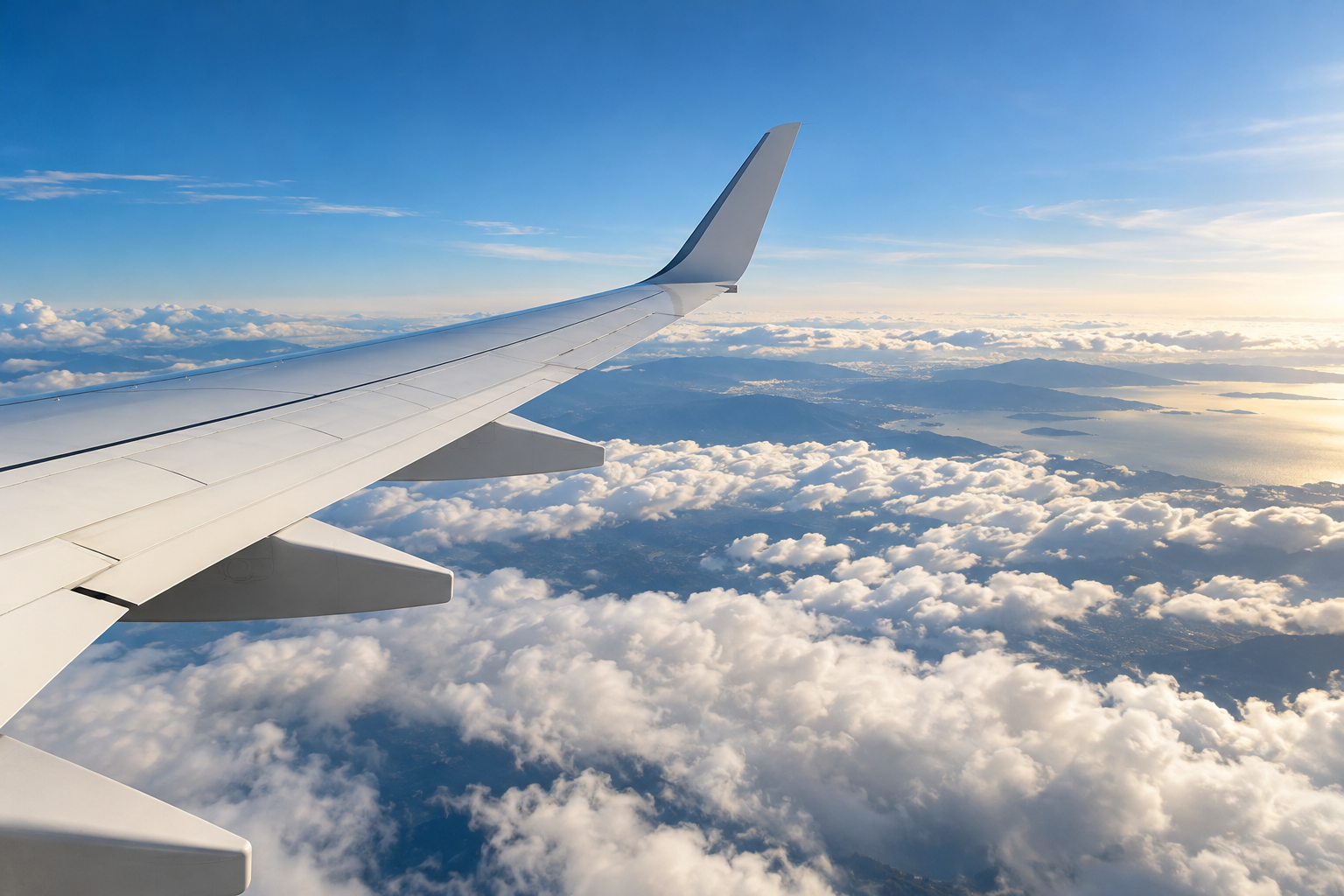 Generated photorealistic illustration of an airplane wing above clouds