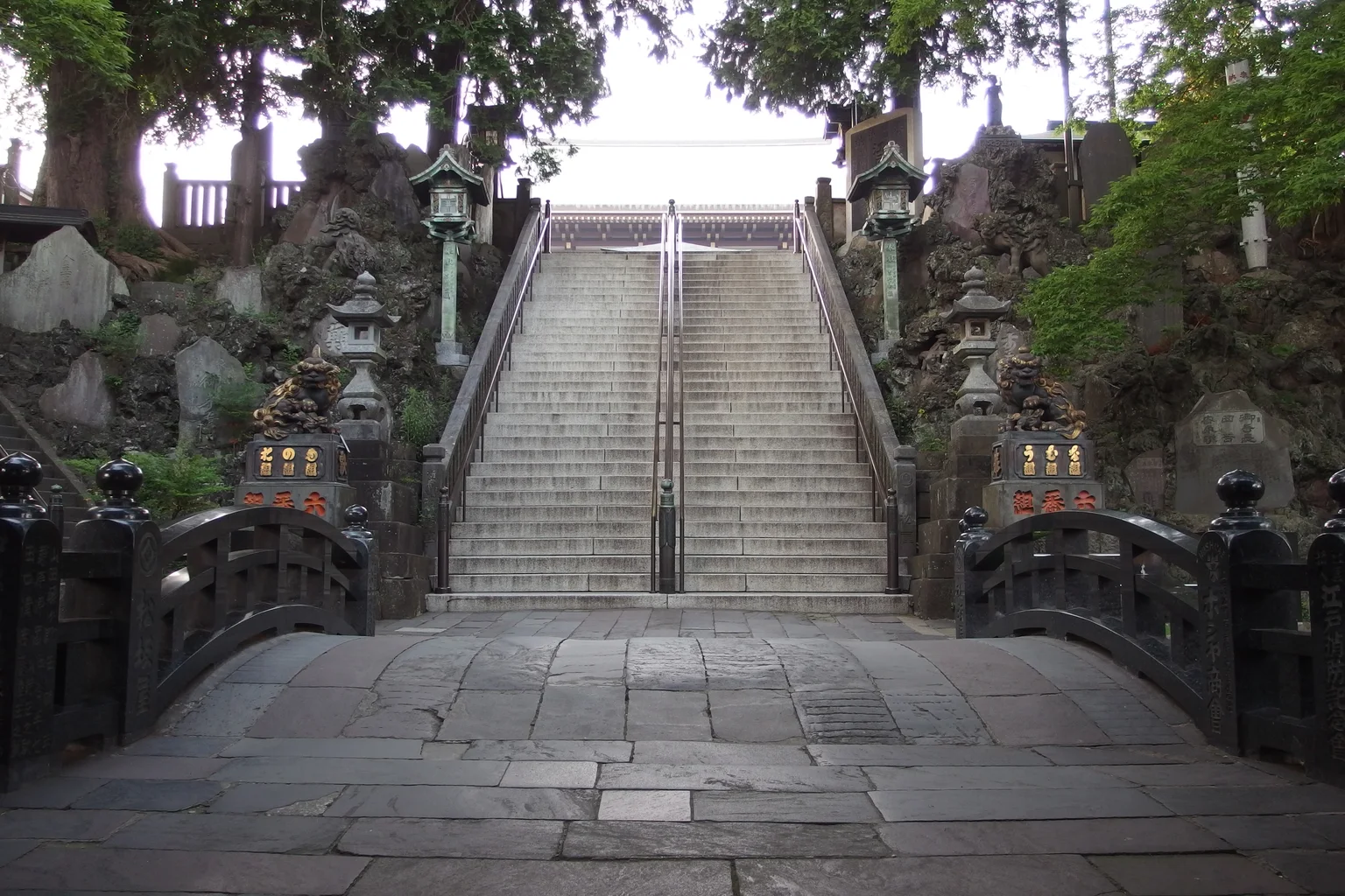 Stone steps and lanterns in the grounds of Naritasan Shinshoji Temple in Narita